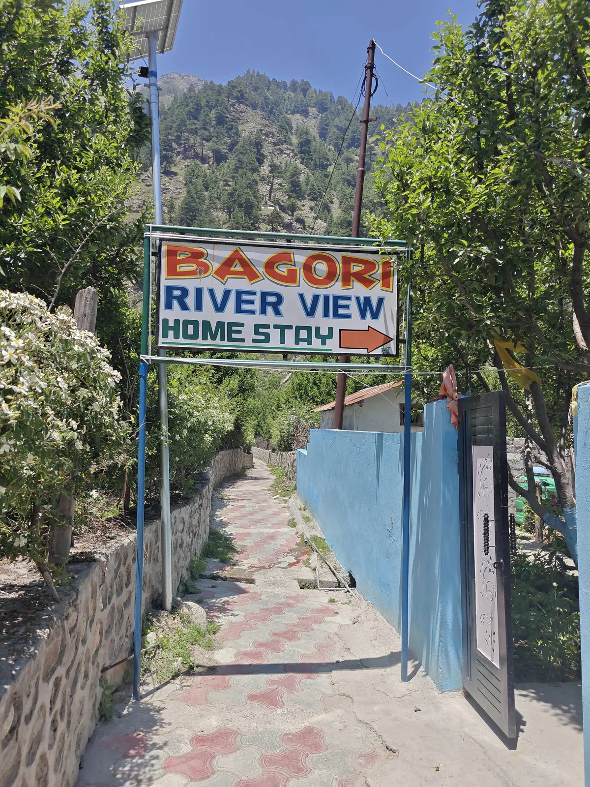 Bagori Riverview Homestay entrance sign